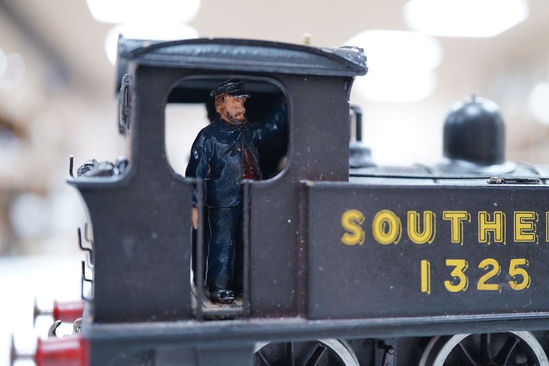 An 0 gauge scratch built model railway locomotive by John Worsley, a Southern Railway P class 0-6-0T, 1325, a detailed model with opening smoke box door showing the details of the blast pipe and boiler tube ends, sprung